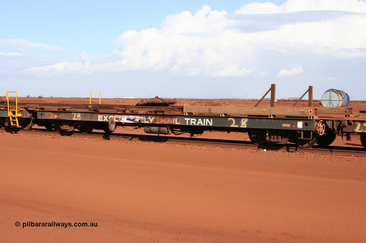 050319 0143
Nelson Point, rail recovery and transport train, 2nd lead off waggon 6201, built by Comeng WA, the mesh guarding is for the winch cable. The chute arrangement for the discharging and recovery of rail is visible.
Keywords: Comeng-WA;BHP-rail-train;