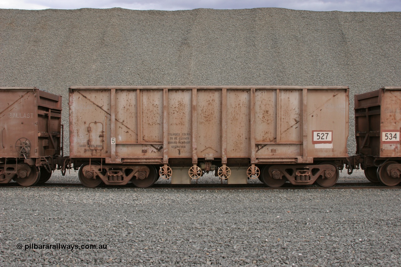 050412 0750
Quarry 8, Shaw Siding area. Side view of 1963 built Magor USA waggon 527, originally in ore service before conversion to a ballast waggon.
Keywords: Magor-USA;BHP-ballast-waggon;