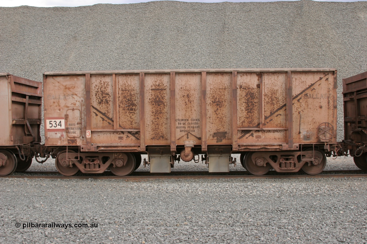 050412 0752
Quarry 8, Shaw Siding area. Side view of 1963 built Magor USA waggon 534, originally in ore service before conversion to a ballast waggon.
Keywords: Magor-USA;BHP-ballast-waggon;