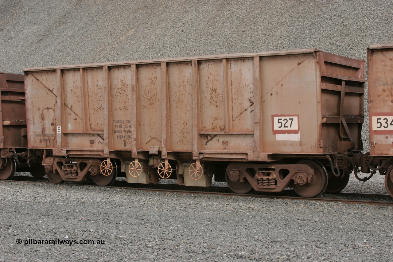 050412 0753
Quarry 8, Shaw Siding area. 3/4 view of 1963 built Magor USA waggon 527, originally in ore service before conversion to a ballast waggon.
Keywords: Magor-USA;BHP-ballast-waggon;