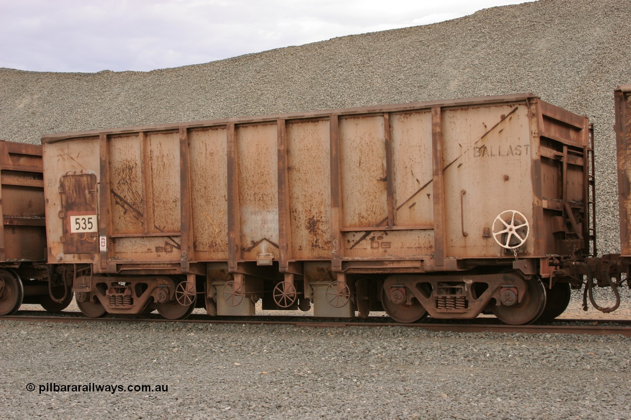 050412 0773
Quarry 8, Shaw Siding area. 3/4 view of 1963 built Magor USA waggon 535, originally in ore service before conversion to a ballast waggon.
Keywords: Magor-USA;BHP-ballast-waggon;