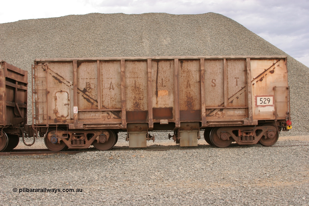 050412 0774
Quarry 8, Shaw Siding area. Side view of 1963 built Magor USA waggon 529, originally in ore service before conversion to a ballast waggon.
Keywords: Magor-USA;BHP-ballast-waggon;