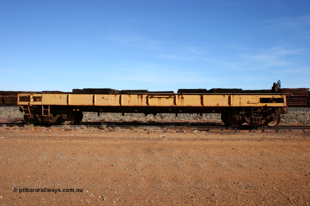 050518 2118
Flash Butt yard, heavily stripped down riveted waggon 206, possible original ballast waggon, number 206 was originally a waggon in the 'Camp Train' and appears to have USA origin, side view.
Keywords: BHP-flat-waggon;