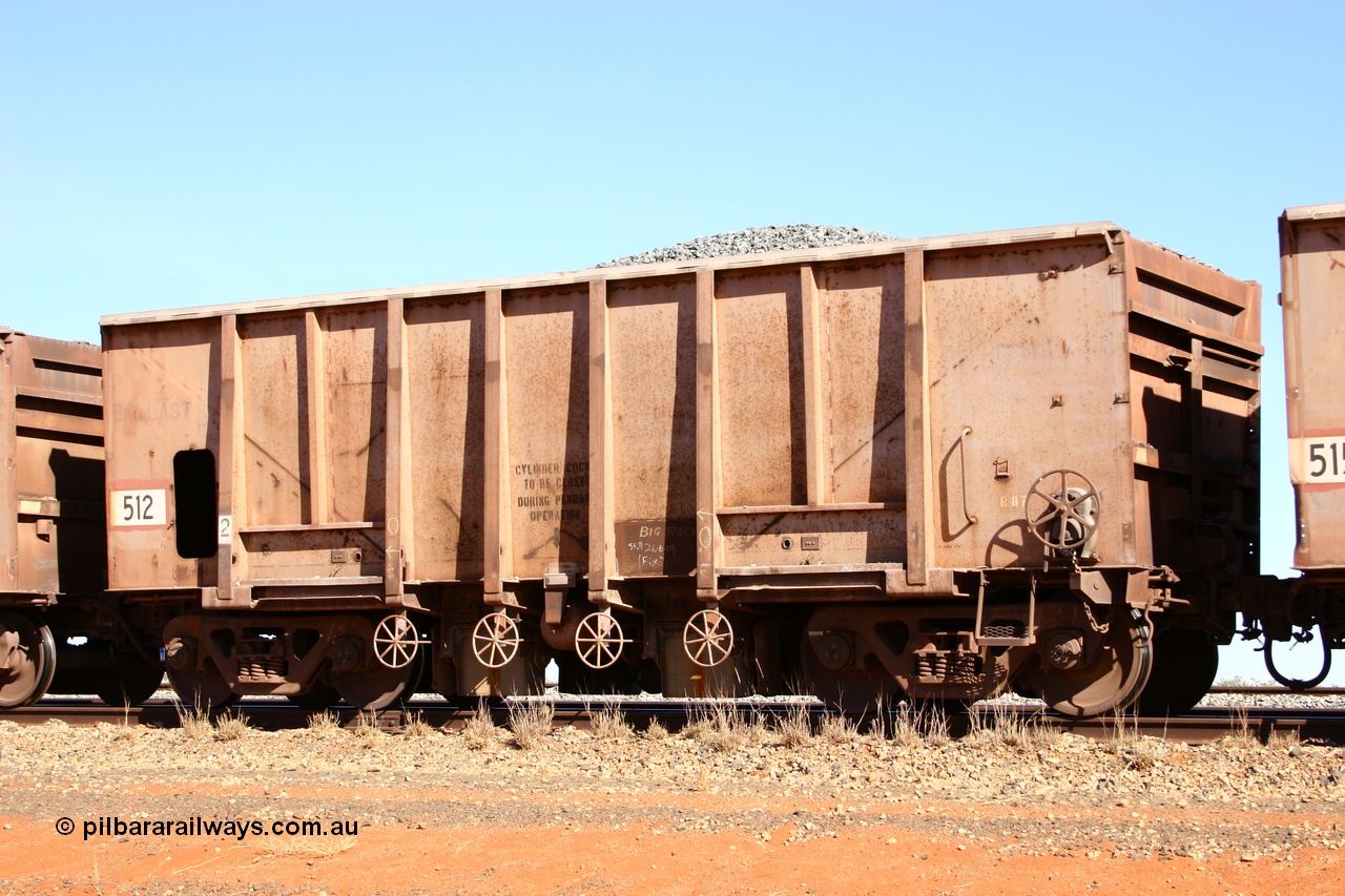 050518 2176
Bing Siding. 3/4 view of 1963 built Magor USA waggon 512, one of twenty waggons originally used on the Oroville Dam construction before coming to the Pilbara in January 1968 as ballast waggons.
Keywords: Magor-USA;BHP-ballast-waggon;