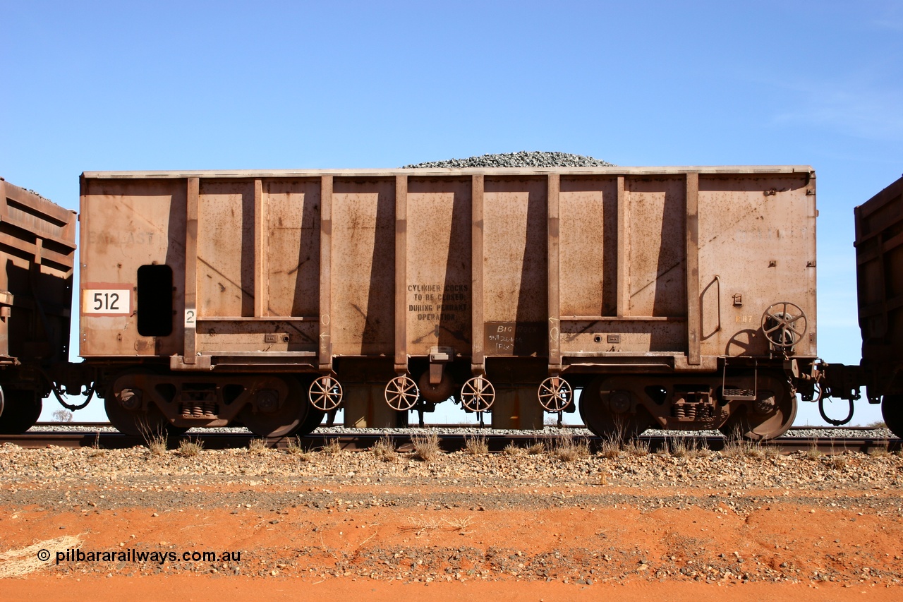 050518 2177
Bing Siding. Side view of 1963 built Magor USA waggon 512, one of twenty waggons originally used on the Oroville Dam construction before coming to the Pilbara in January 1968 as ballast waggons.
Keywords: Magor-USA;BHP-ballast-waggon;
