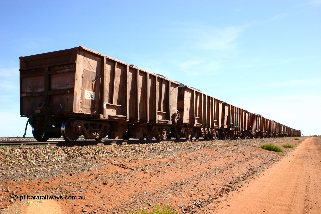 050518 2202
Bing Siding. Rear 3/4 view of ballast train and of 1963 built Magor USA waggon 536, originally in ore service before conversion to a ballast waggon.
Keywords: Magor-USA;BHP-ballast-waggon;