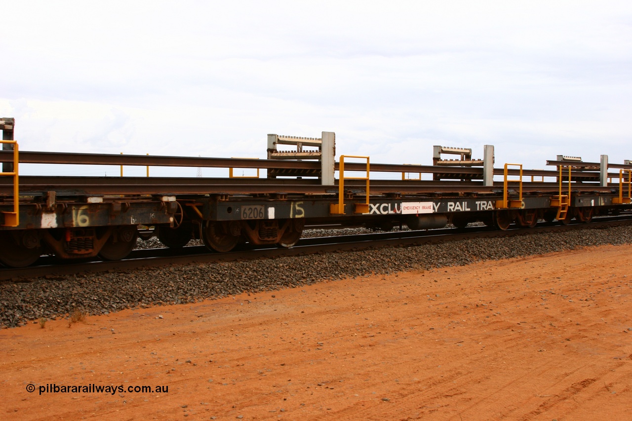 050522 2725
Goldsworthy Junction, rail recovery and transport train flat waggon #15, 6206 built by Comeng WA in January 1977 under order number 07-M-282 RY.
Keywords: Comeng-WA;BHP-rail-train;
