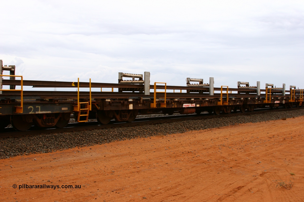 050522 2736
Goldsworthy Junction, rail recovery and transport train flat waggon #26, 6015, built by Comeng WA in November 1971.
Keywords: Comeng-WA;BHP-rail-train;