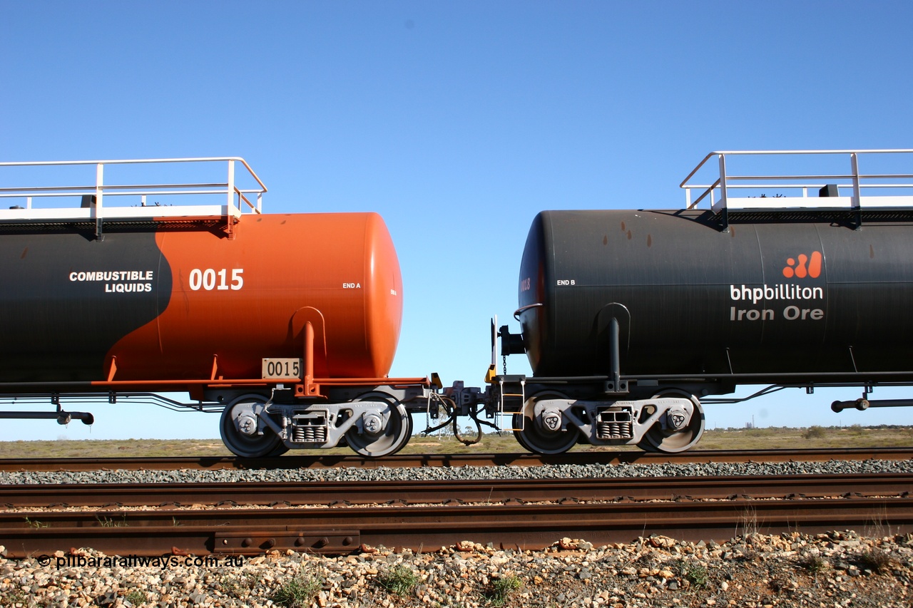 050704 3982
Bing Siding, empty 116 kL Comeng WA built tank waggon 0015 from 1974-5, one of six such tank waggons, detail of the A end and bogie and the B end of 0018, both wearing the BHP Billiton Earth livery.
Keywords: Comeng-WA;BHP-tank-waggon;