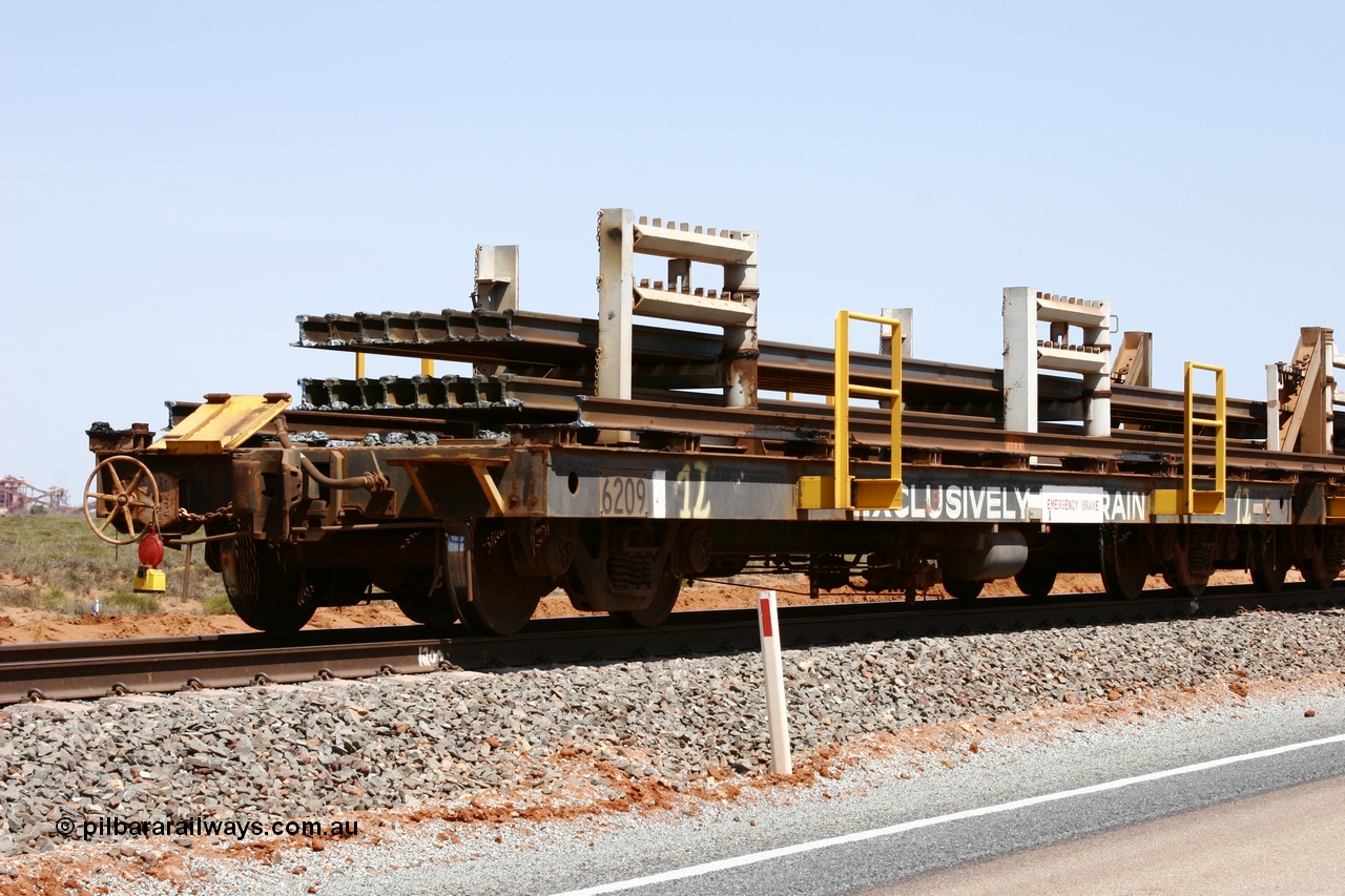 051001 5684
Boodarie, the Steel Train or rail recovery and transport train, flat waggon #12, 6209, a Comeng WA built flat waggon from January 1977 under order no. 07-M-282 RY.
Keywords: Comeng-WA;BHP-rail-train;