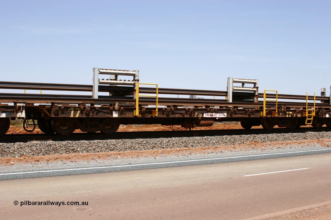 051001 5696
Boodarie, the Steel Train or rail recovery and transport train, flat waggon #17, 6016 a Comeng WA built flat waggon from 1971 which carries no. 6506-016.
Keywords: Comeng-WA;BHP-rail-train;