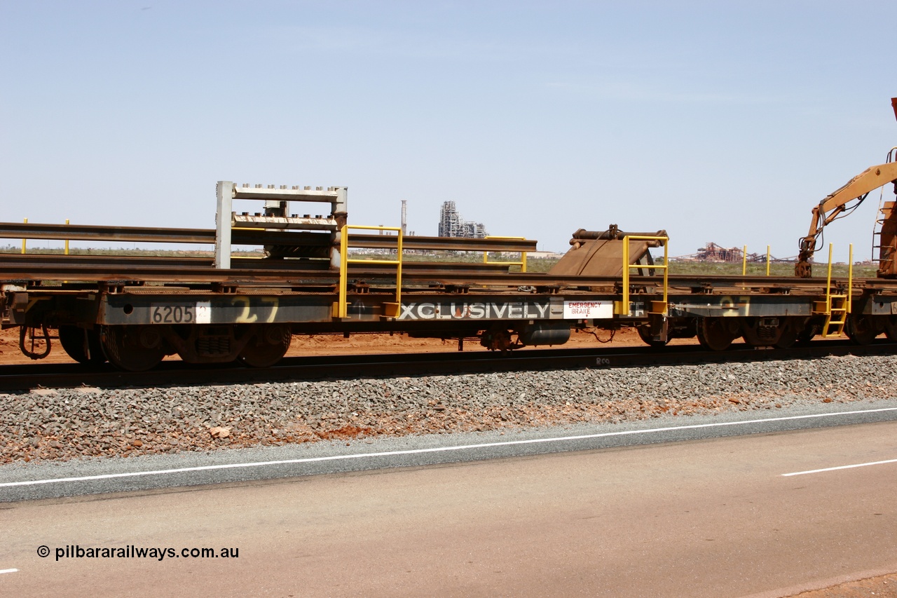 051001 5720
Boodarie, the Steel Train or rail recovery and transport train flat waggon #27, third lead off waggon, 6205, built by Comeng WA in February 1977 under order no. 07-M-282 RY.
Keywords: Comeng-WA;BHP-rail-train;