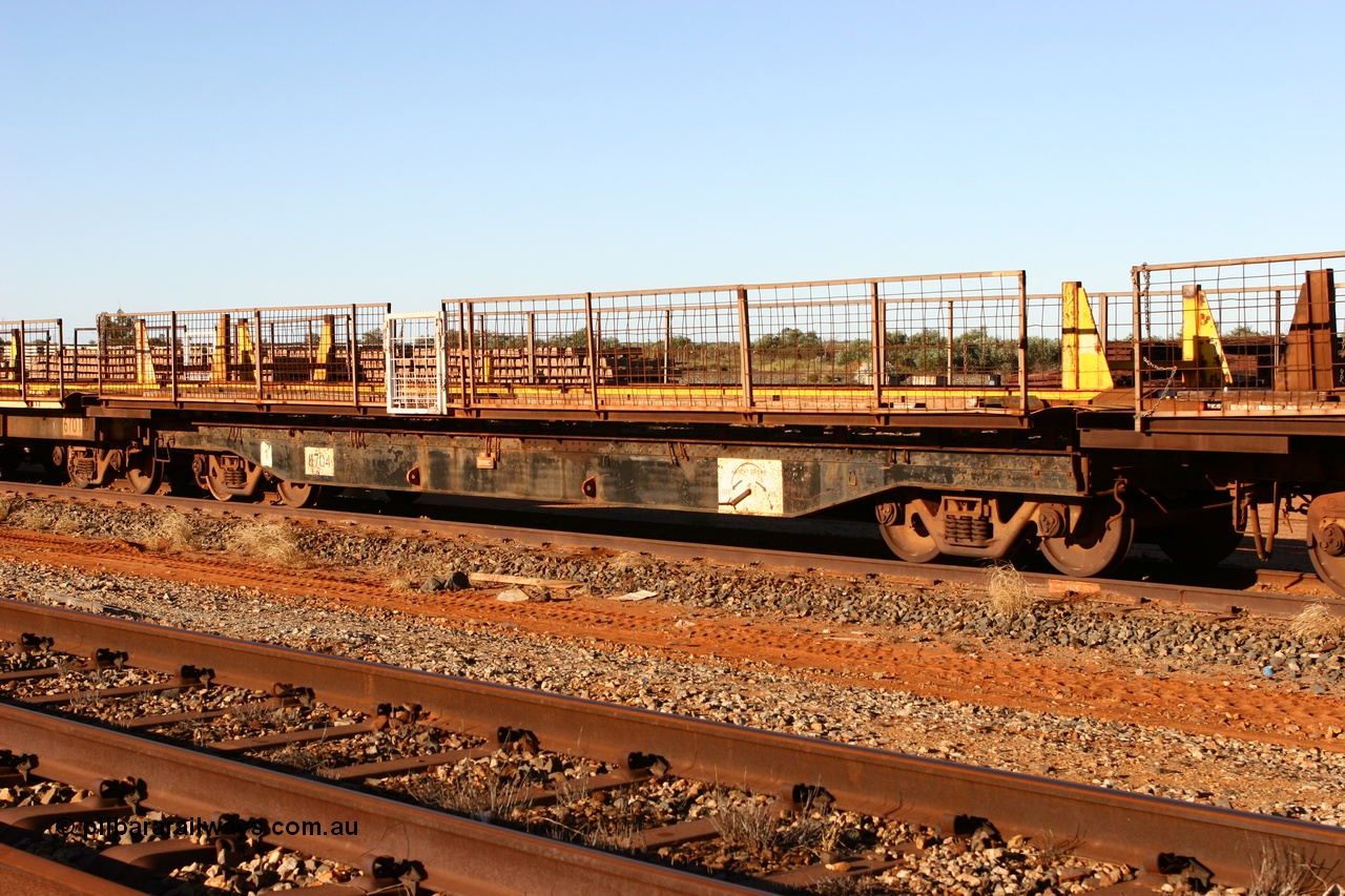 060429 3740
Flash Butt yard, Pony re-laying waggon 6704 flat waggon, unsure of history or who built it or where it came from, it looks to be heavy duty with riveted side frames and an odd handbrake arrangement.
Keywords: BHP-pony-waggon;