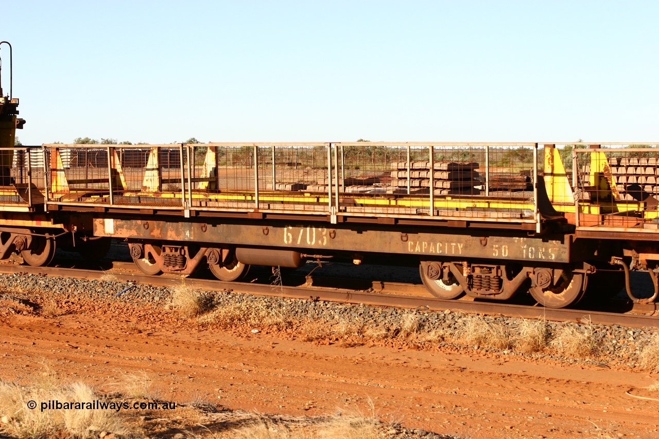060429 3745
Flash Butt yard, Pony re-laying waggon 6703 is a heavily cut down and modified Magor USA ore waggon done by Mt Newman Mining workshops, converted to a 50 tonne flat waggon.
Keywords: BHP-pony-waggon;Magor-USA;Mt-Newman-Mining-WS;