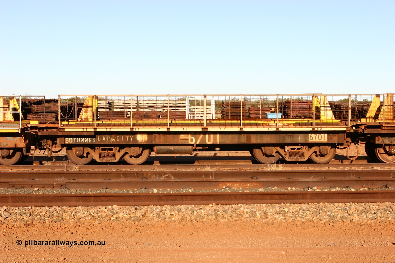 060429 3752
Flash Butt yard, Pony re-laying waggon 6702 is a heavily cut down and modified Magor USA ore waggon done by Mt Newman Mining workshops, converted to a 50 tonne flat waggon.
Keywords: BHP-pony-waggon;Magor-USA;Mt-Newman-Mining-WS;