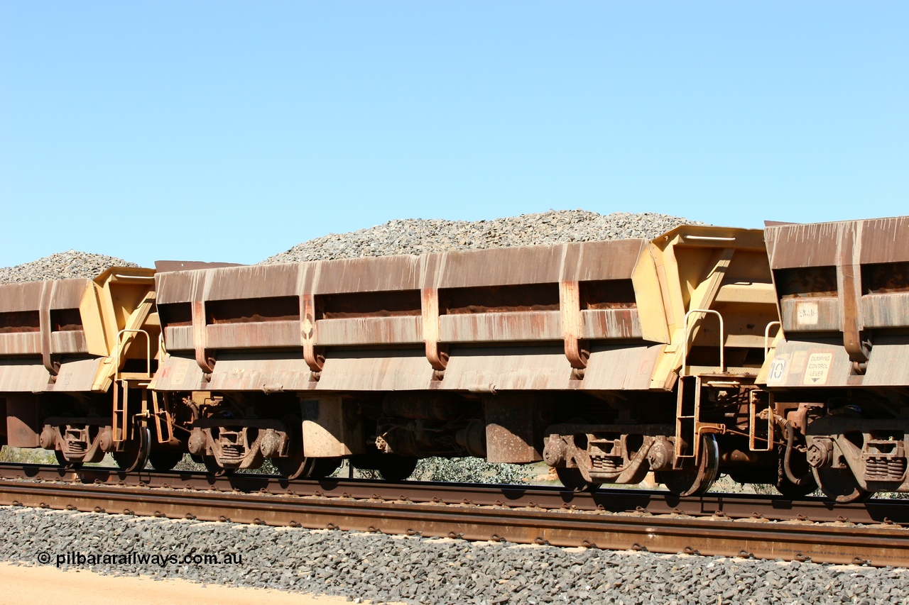 060501 3876
Tabba Siding, originally built by Difco USA for Goldsworthy Mining Ltd in 1967 as a batch of five, prefixed with 870 in BHP service, 8705 side dump waggon loaded with ballast.
Keywords: Difco-Ohio-USA;GML;BHP-ballast-waggon;