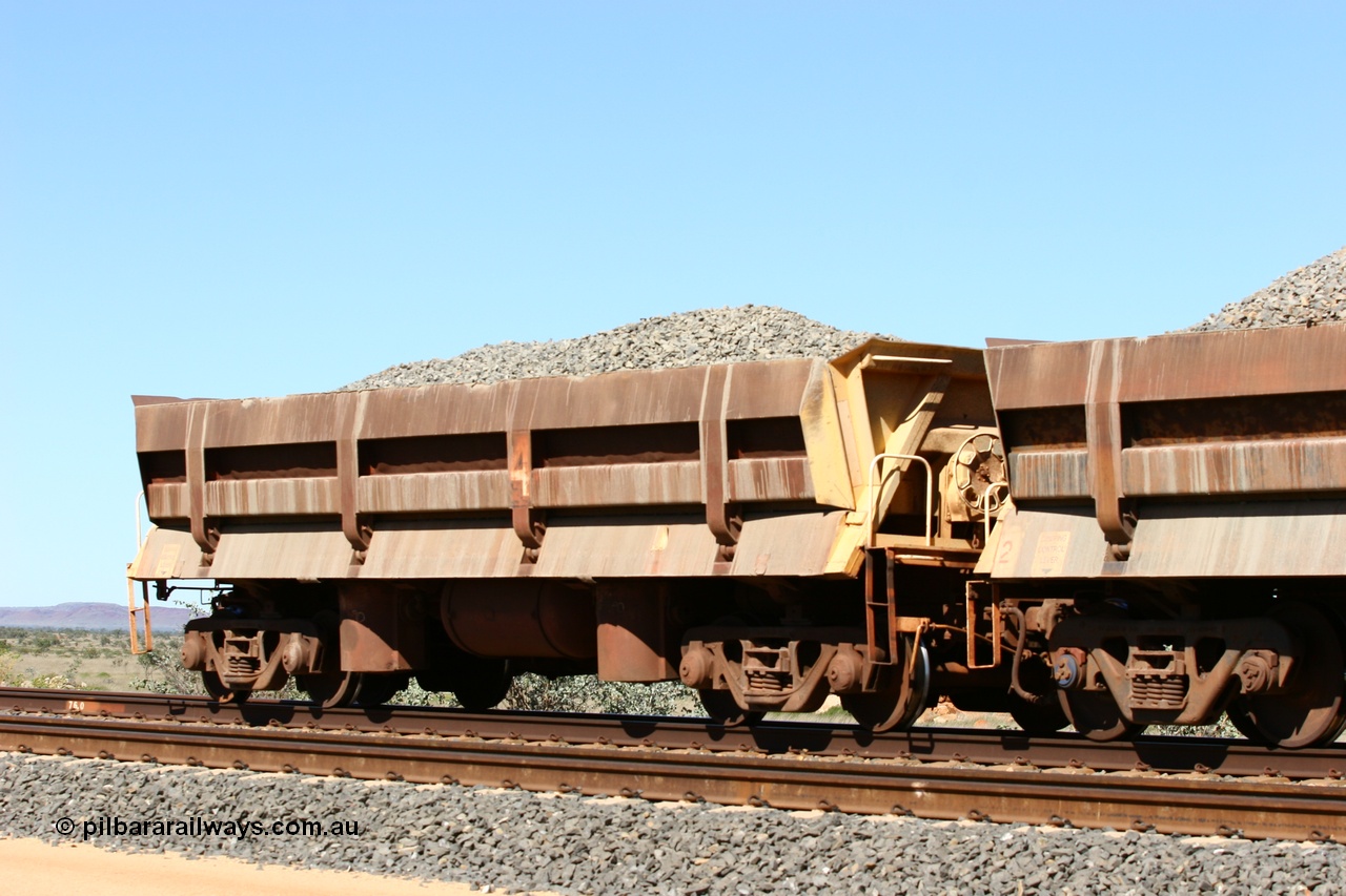 060501 3879
Tabba Siding, originally built by Difco USA for Goldsworthy Mining Ltd in 1967 as a batch of five, prefixed with 870 in BHP service, 8704 side dump waggon loaded with ballast.
Keywords: Difco-Ohio-USA;GML;BHP-ballast-waggon;