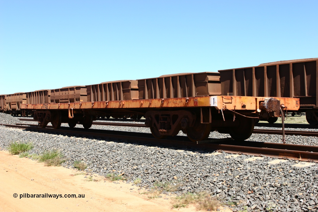 060501 3945
Spring Siding, flat waggon #5, also marked as 6705 in the back track, originally in service with Goldsworthy Mining as a BC or BCV box van, built by Comeng WA in 1966.
Keywords: Comeng-WA;GML;BHP-flat-waggon;