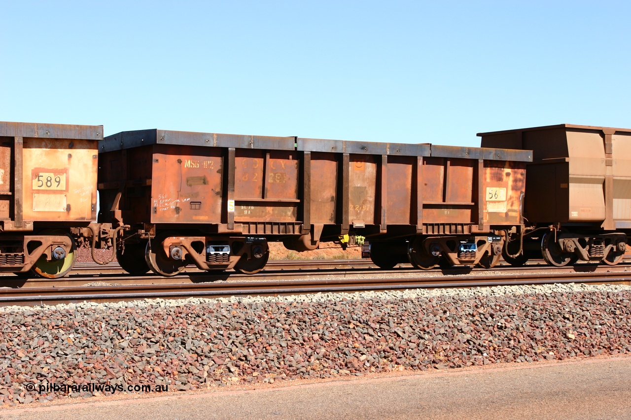 060710 6302
Boodarie Yard, modified original Magor USA built Oroville waggon 567, cut down and covered and in use as indexing waggons on the front of each rake for Finucane Island car dumpers, note the original ODCX marking visible.
Keywords: Magor-USA;Oroville;BHP-index-waggon;