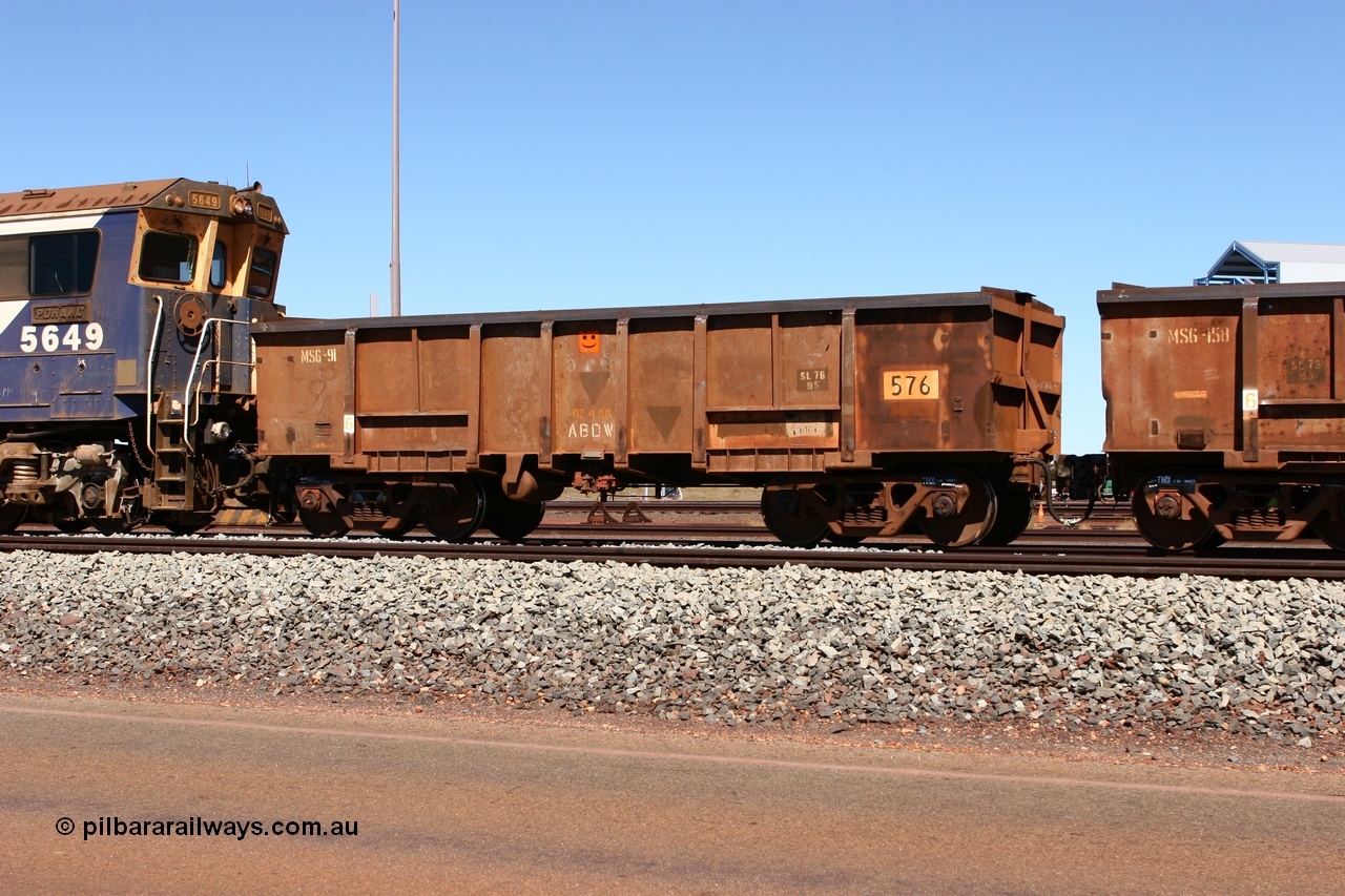 060713 6546
Boodarie Yard, modified original Magor USA built Oroville waggon 576, cut down and covered and in use as indexing waggons on the front of each rake for Finucane Island car dumpers, note the original ODCX marking visible.
Keywords: Magor-USA;Oroville;BHP-index-waggon;