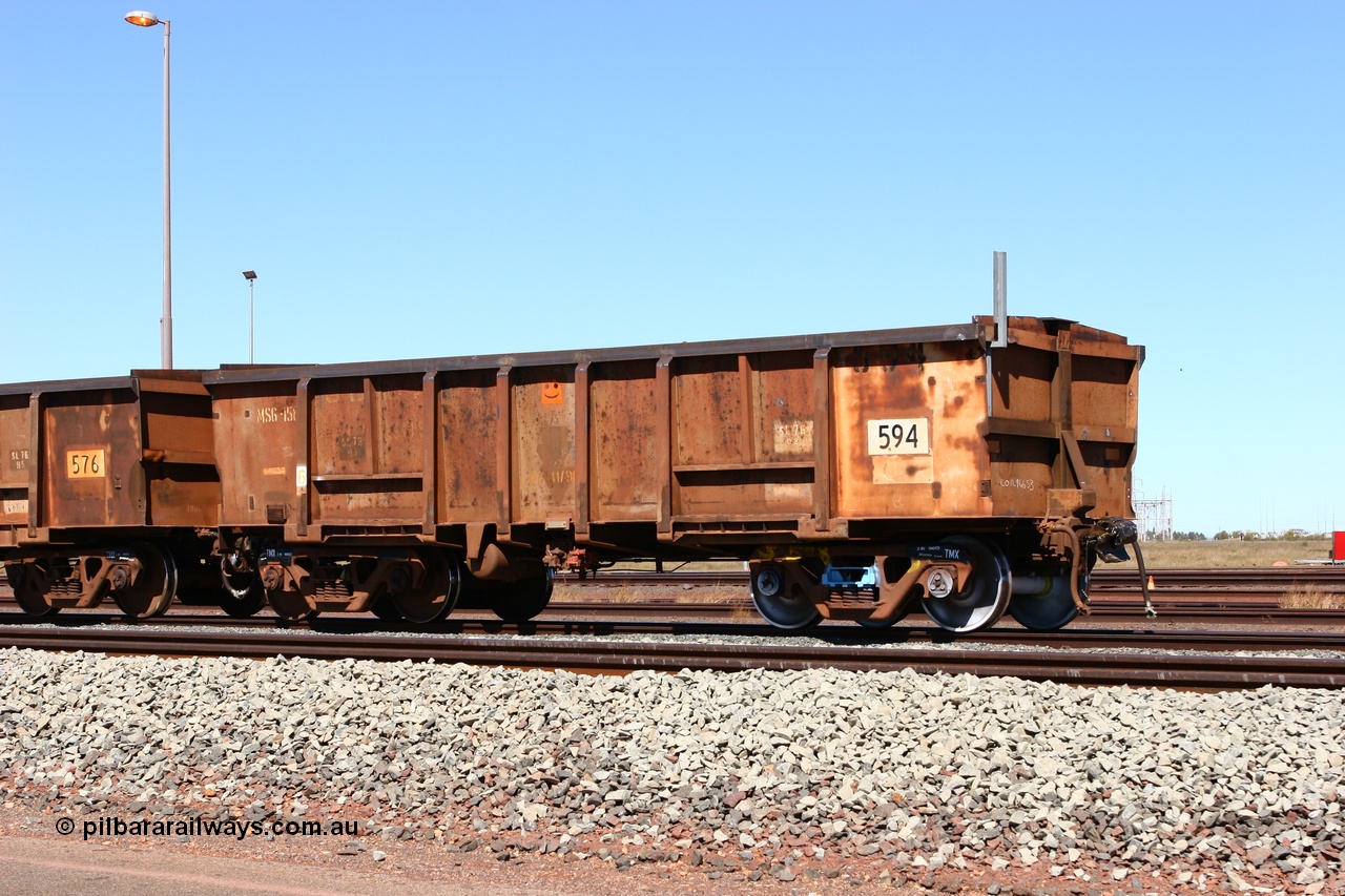060713 6548
Boodarie Yard, modified original Magor USA built Oroville waggon 594, cut down and covered and in use as indexing waggons on the front of each rake for Finucane Island car dumpers, note the original ODCX marking visible.
Keywords: Magor-USA;Oroville;BHP-index-waggon;