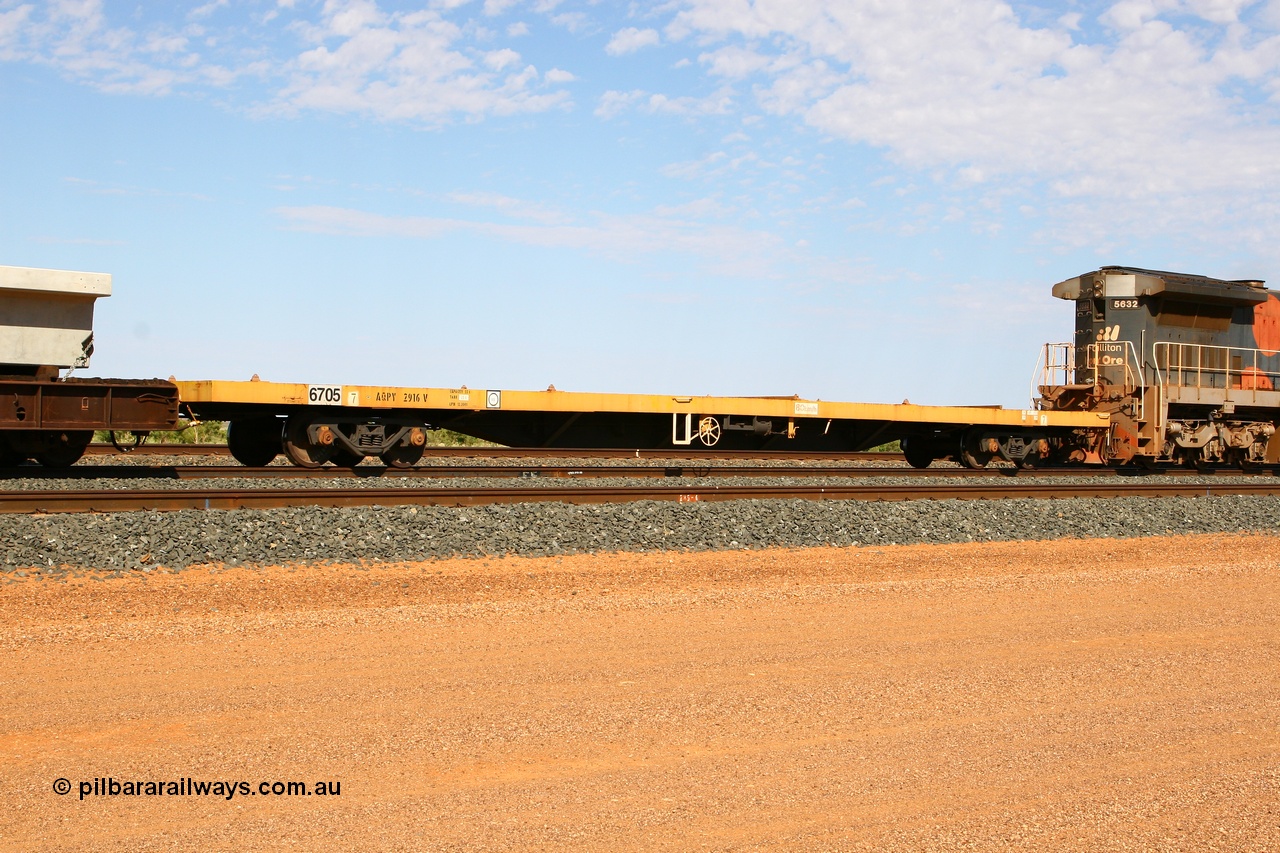 071202 1232
Turner Siding, CFCLA flat waggon AQPY type AQPY 2916, also carrying BHP road number 6705, a 55 tonne capacity waggon.
Keywords: 6705;AQPY-type;AQPY2916;CFCLA;BHP-flat-waggon;