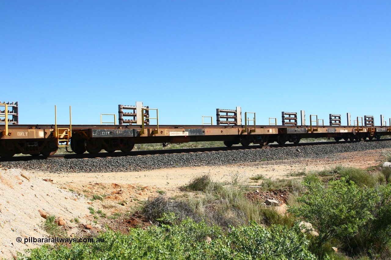080621 2716
Tabba South, one of a batch of six flat waggons converted by Mt Newman Mining workshops by cutting down a pair of ore waggons to make one flat waggon, 6104 in service with the rail recovery and transport train as waggon #6.
Keywords: Mt-Newman-Mining-WS;Magor-USA;BHP-rail-train;