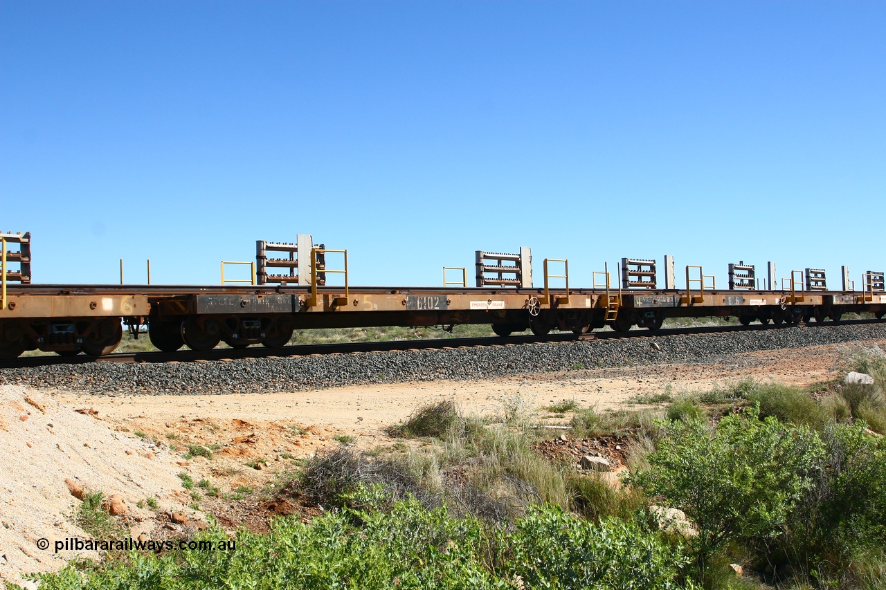 080621 2717
Tabba South, one of a batch of six flat waggons converted by Mt Newman Mining workshops by cutting down a pair of ore waggons to make one flat waggon, 6102 in service with the rail recovery and transport train as waggon #5.
Keywords: Mt-Newman-Mining-WS;Magor-USA;BHP-rail-train;
