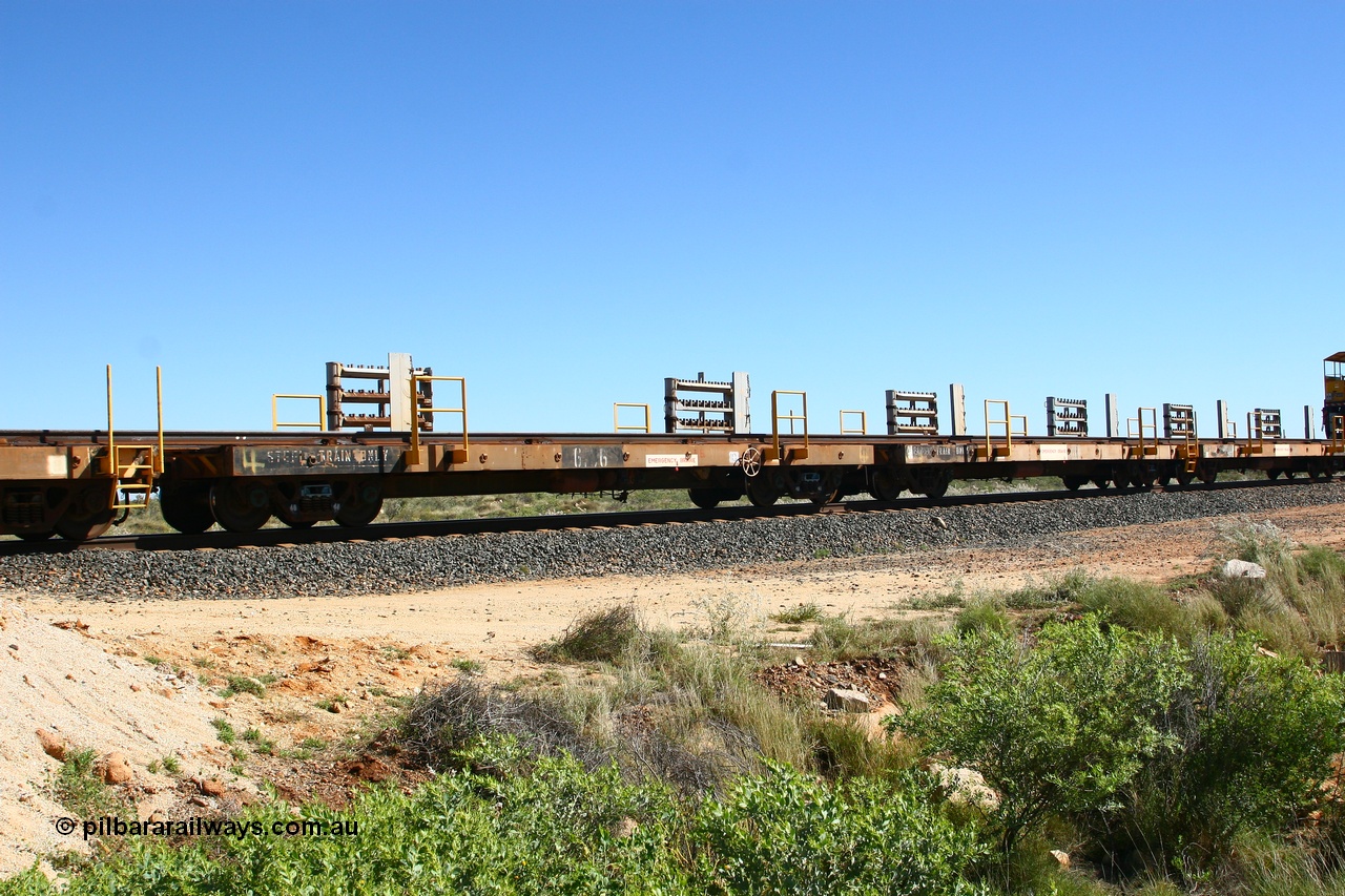 080621 2718
Tabba South, one of a batch of six flat waggons converted by Mt Newman Mining workshops by cutting down a pair of ore waggons to make one flat waggon, 6106 in service with the rail recovery and transport train as waggon #4.
Keywords: Mt-Newman-Mining-WS;Magor-USA;BHP-rail-train;