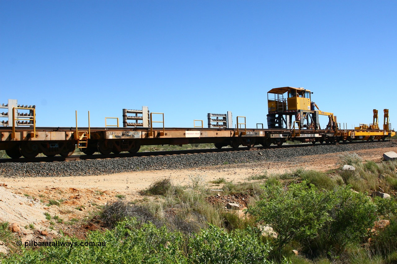 080621 2720
Tabba South, one of a batch of six flat waggons converted by Mt Newman Mining workshops by cutting down a pair of ore waggons to make one flat waggon, 6105 in service with the rail recovery and transport train as waggon #2.
Keywords: Mt-Newman-Mining-WS;Magor-USA;BHP-rail-train;