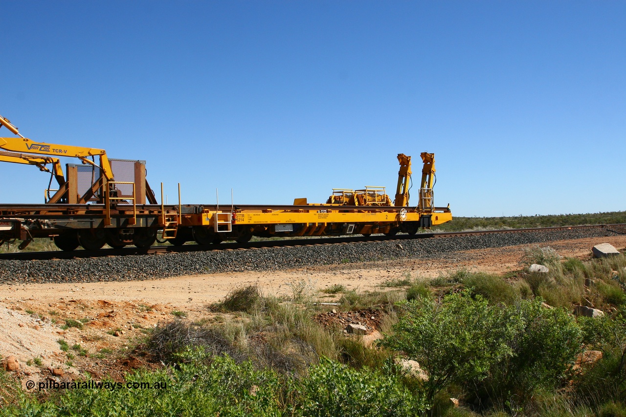 080621 2722
Tabba South, new Lead-Off Lead-On waggon STTR class STTR 6214 on the end of the Steel Train or rail recovery and transport train, built by Gemco Rail WA, the chutes can be seen standing up with the squeeze rollers behind the mesh.
Keywords: Gemco-Rail-WA;BHP-rail-train;STTR-type;STTR6214;