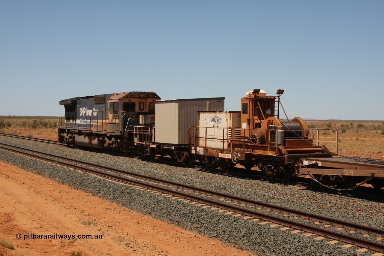 081217 0451
Woodstock Siding, rail recovery and transport train flat waggon #30, 6702, heavily cut down and modified Magor USA ore waggon by Mt Newman Mining workshops, converted to a 50 tonne flat waggon and designated the winch waggon with generator set to power the winch and the crib car.
Keywords: Magor-USA;Mt-Newman-Mining-WS;BHP-rail-train;
