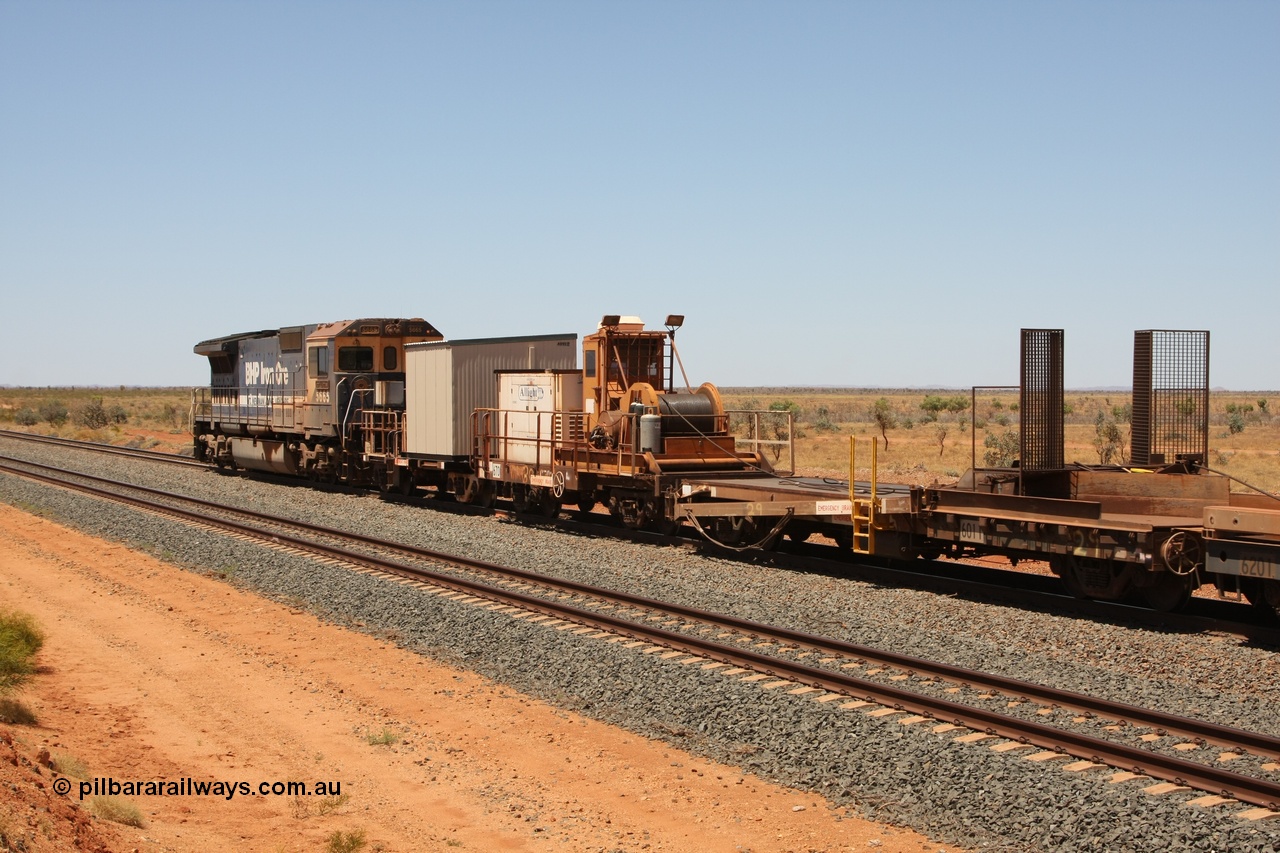 081217 0452
Woodstock Siding, rail recovery and transport train, waggon #29, 1st lead off waggon 6011, built by Scotts of Ipswich Qld on 04-09-1970, the mesh guarding is for the winch cable. The chute arrangement for the discharging and recovery of rail is visible.
Keywords: BHP-rail-train;Scotts-Qld;