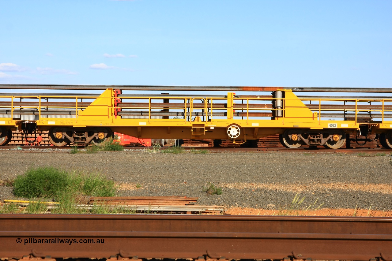110208 9441
Flash Butt yard, new rail stock carrier waggon 6033 loaded with strings of rail, built by Gemco Rail in late 2009-10 with Barber bogies.
Keywords: BHP-rail-train;Gemco-Rail-WA;
