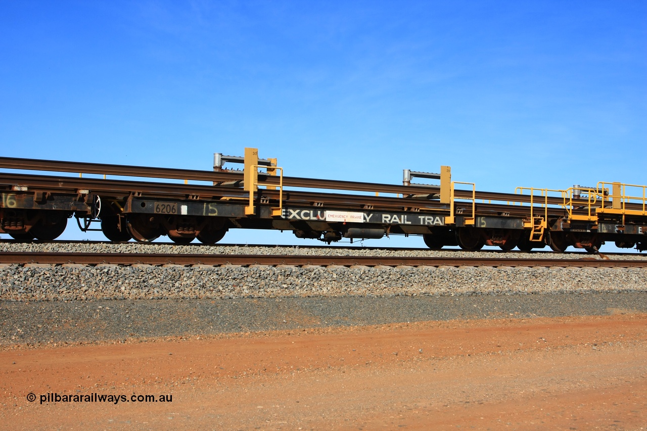 110619 1885
South of Mooka Siding, the Steel Train or rail recovery and transport train, flat waggon #15, 6206, a Comeng WA built flat waggon from January 1977 under order no. 07-M-282 RY.
Keywords: BHP-rail-train;Comeng-WA;