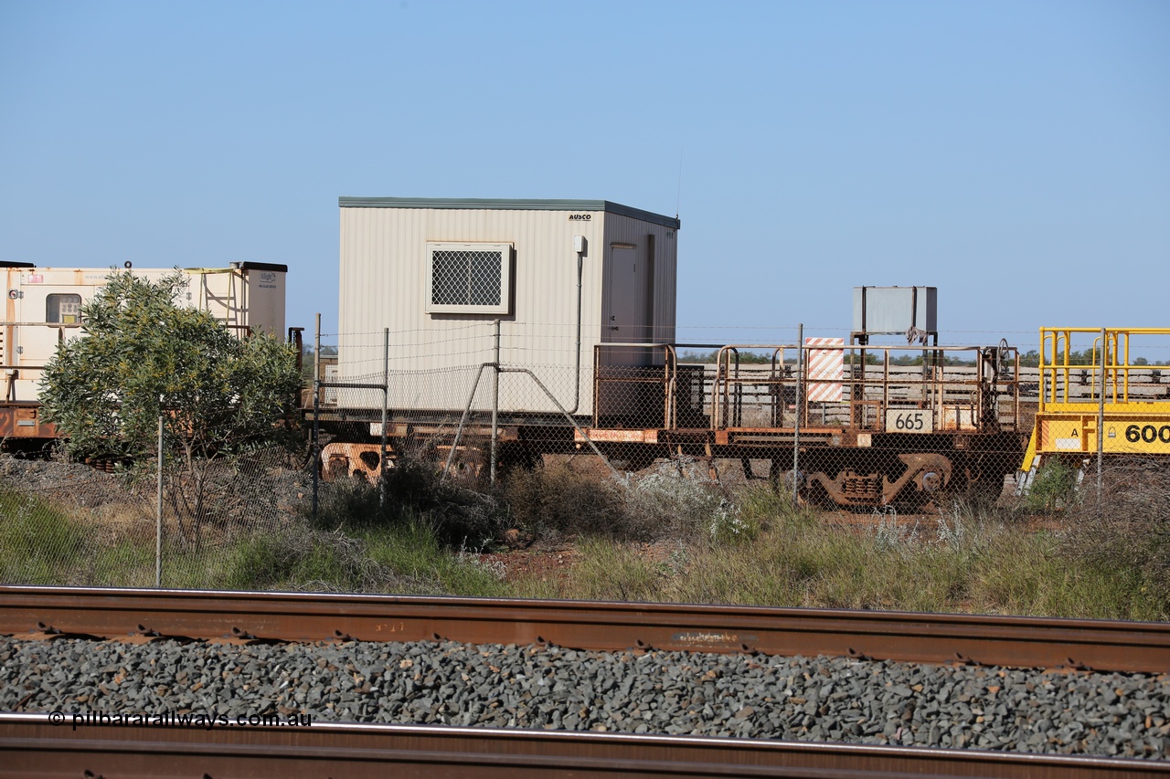 130720 1557
Flash Butt yard, out of service crib waggon a cut down Magor USA built Oroville ore waggon, seen here with a new Ausco donga replacing the original ATCO unit.
Keywords: Magor-USA;Mt-Newman-Mining-WS;BHP-rail-train;