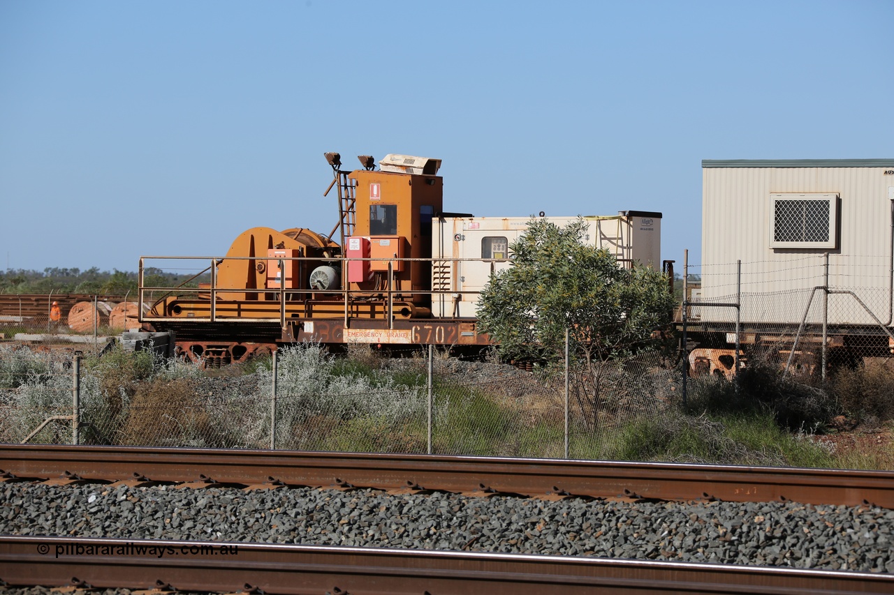 130720 1558
Flash Butt yard, rail recovery and transport train, flat waggon 6702, heavily cut down and modified Magor USA ore waggon by Mt Newman Mining workshops, converted to a 50 tonne waggon and designated the winch waggon with generator set to power the winch and the crib car.
Keywords: Magor-USA;Mt-Newman-Mining-WS;BHP-rail-train;