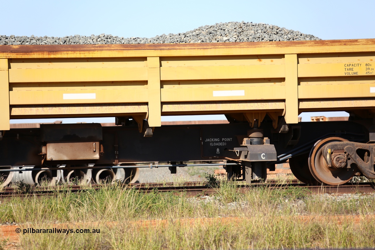 150619 9081
Flash Butt yard, CNR-QRRS of China built side dump waggons, built and delivered around 2011-12, waggon 0710 loaded with fines for sheeting, mid-section detail.
Keywords: CNR-QRRS-China;BHP-ballast-waggon;