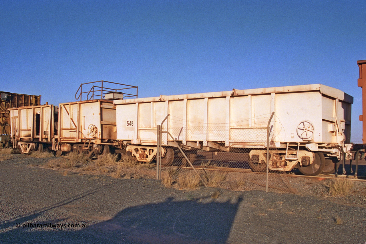 CC5 Mt Newman Mining Workshops 257-21
Flash Butt yard, compressor waggon set No. 5. Modified Magor USA built ore waggons 548 and 585 to form the compressor set. Was used during the unloading process, now seen here stored out of service.
Keywords: Magor-USA;BHP-compressor-set