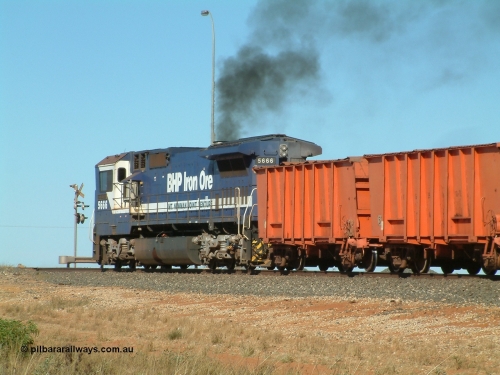 040806 092046
Goldsworthy Junction, 5666 runs the weighbridge test train with the four orange weighbridge test waggons and two ore waggons to provide braking.
