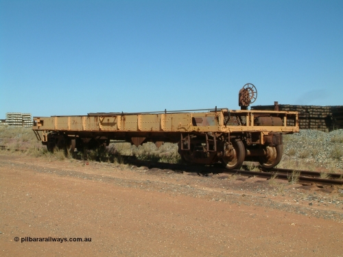 0206 Mt Newman Mining Workshops 040806 101910
Flash Butt yard, heavily stripped down riveted waggon 206, possible original ballast waggon, number 206 was originally a waggon in the 'Camp Train' and appears to have USA origin, 3/4 view from handbrake end.
