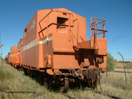 2626 Mt Newman Mining Workshops 040806 102832
Flash Butt yard, rear view of stored out of service LocoTrol waggons, 2626 closest to camera, then 661, 2065 and 2703 Test Car.
Keywords: Comeng-WA;BHP-Locotrol-waggon;
