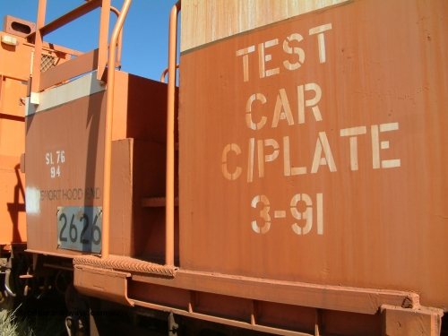 2626 Mt Newman Mining Workshops040806 102928
Flash Butt yard, rear view of stored out of service LocoTrol waggon 2626 showing number board and the short hood end.
Keywords: Comeng-WA;BHP-Locotrol-waggon;