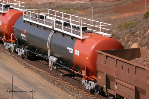 0018 Comeng WA 050315 0233
Redbank Bridge, elevated view of empty 116 kL fuel tanks all built by Comeng in both NSW and WA, on the rear of a loaded ore train arriving into Nelson Point yard, waggons include 0018, 0015, 0017, 0012, 0016, 0014, 0013, 0011 and 0010.
Keywords: Comeng-WA;Comeng-NSW;BHP-tank-waggon;