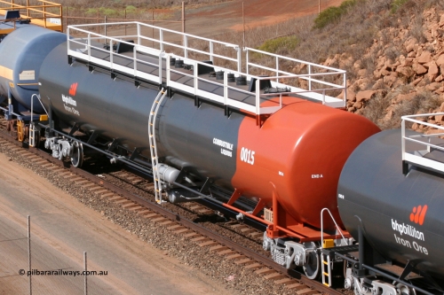 0015 Comeng WA 050315 0234
Redbank Bridge, elevated view of empty 116 kL fuel tanks all built by Comeng in both NSW and WA, 0015 in the Earth livery and 0017 and others in the BHP blue and white livery.
Keywords: Comeng-WA;BHP-tank-waggon;