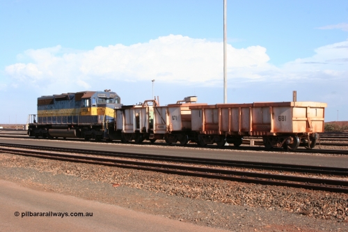 CC1 Mt Newman Mining Workshops 050319 0149
Nelson Point, dumper pilot SD40 3080 with compressor waggon set No. 1, made up of spacer/ballast waggon 681 and compressor waggon 671, both converted from original Magor built 91 ton ore waggons, painted white.
Keywords: Magor-USA;BHP-compressor-set;