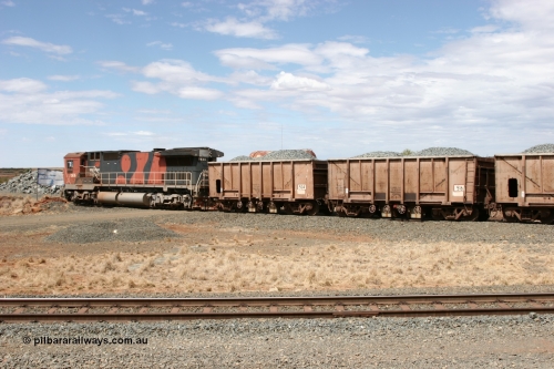 0516 Magor USA 050421 1383
Quarry 8, Shaw Siding area, Dash 8 unit 5636 shunts the loaded ballast rake under the water point on the south leg of the triangle. Original Magor USA built ballast cars 516 and 504 dating from a 1963 build.
Keywords: Magor-USA;BHP-ballast-waggon;