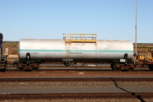 0001 Comeng NSW 050724 4213
Nelson Point yard, Comeng NSW built 82 kilolitre water tank waggon 0001, one of two such tank waggons built in November 1970, attached to the Pony as they relay a road in the yard.
Keywords: Comeng-NSW;BHP-tank-waggon;