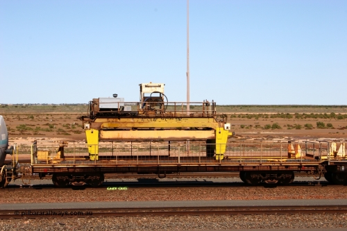 050724 4214
Nelson Point yard, flat waggon #6? in service on the Pony re-laying train as a transport waggon for a gantry car as pictured. Originally in service with Goldsworthy Mining as a BC or BCV box van, built by Comeng WA in 1966.
Keywords: Comeng-WA;GML;BHP-pony-waggon;