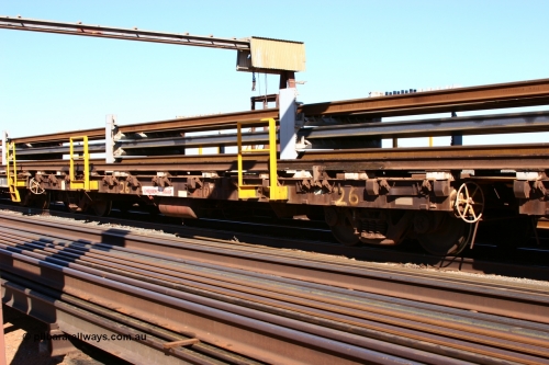 6015 Comeng WA 050801 4771
Flash Butt yard, rail recovery and transport train flat waggon #26, 6015, built by Comeng WA in November 1971.
Keywords: Comeng-WA;BHP-rail-train;